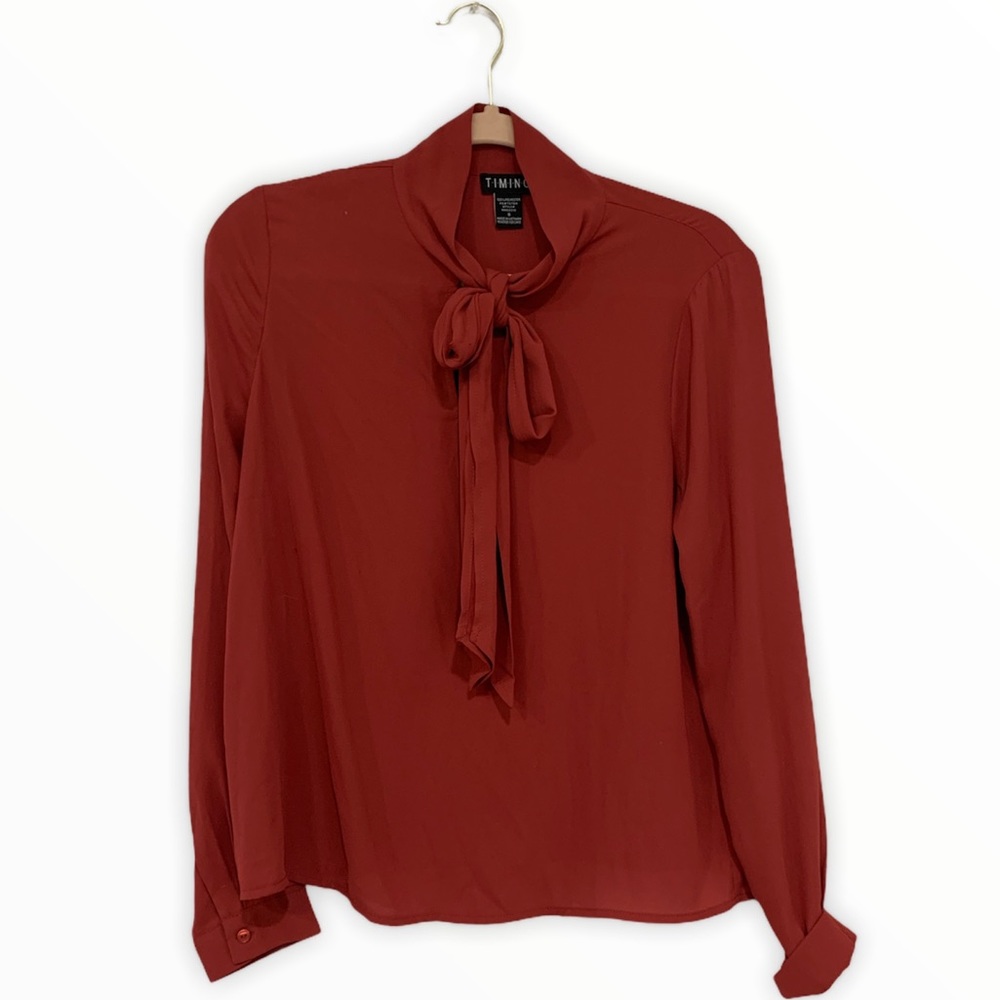 Deep red colored blouse